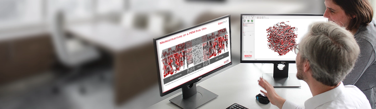 Material scientists analyzing the microstructure of a fuel cell's fiber layer on a computer using GeoDict simulation software