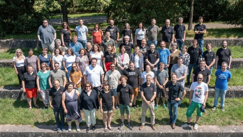 Group photo of the Math2Market team at the company seminar in 2025